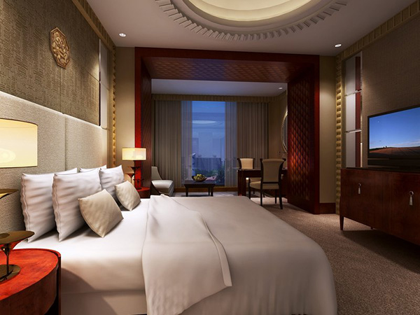 Dimmer is shown controlling the lighting in a bedroom at the WH Ming hotel.